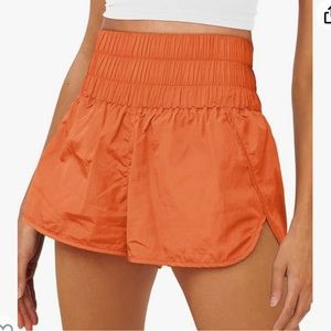 orange puffy lululemon inspired athletic shorts